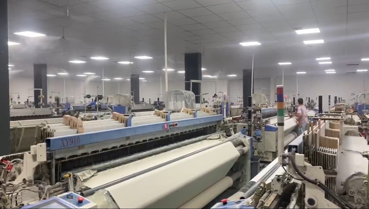 Aisiting grounding textile weaving production facility
